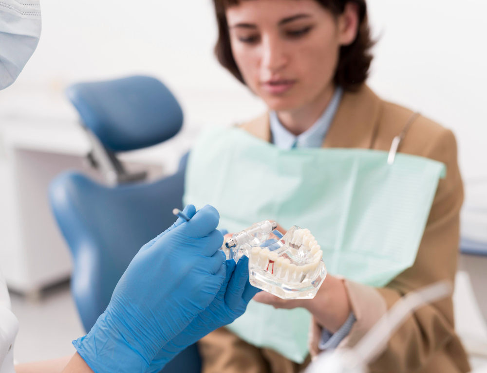 Dental implant treatment showing consultation, 3D imaging, implant placement, abutment, and final crown as part of the overall implant cost.